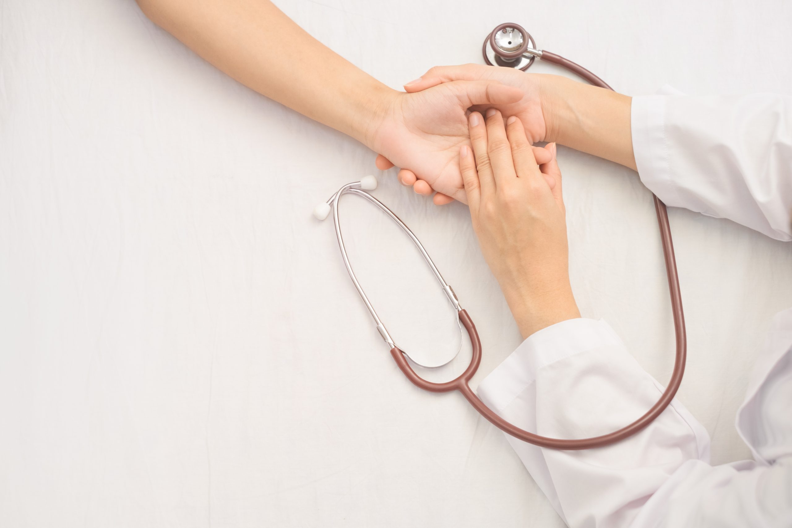 Doctor diagnose to cure disease on patient. Heart and stethoscope for medical health check-up. Healthcare concept.