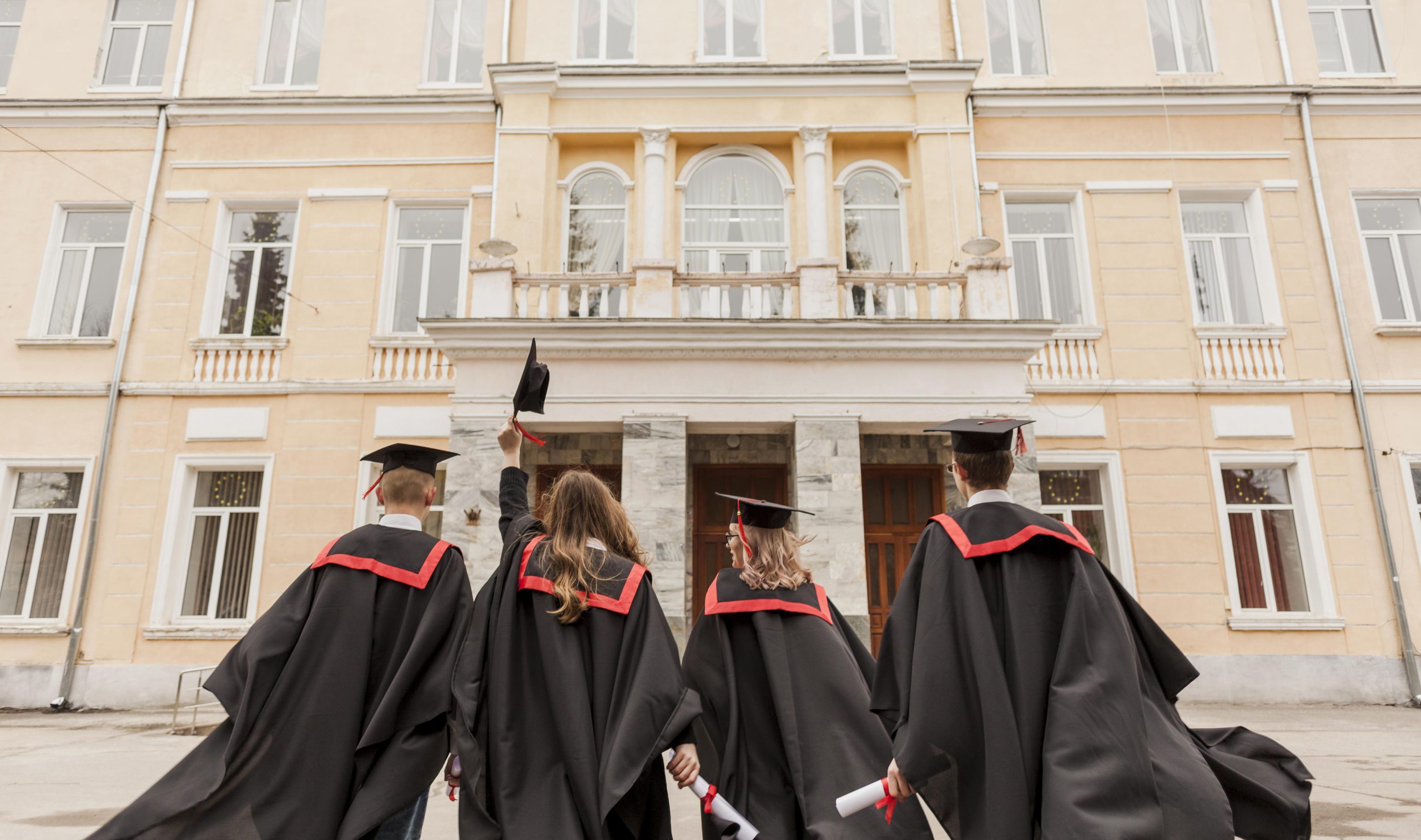 students-looking-university-building